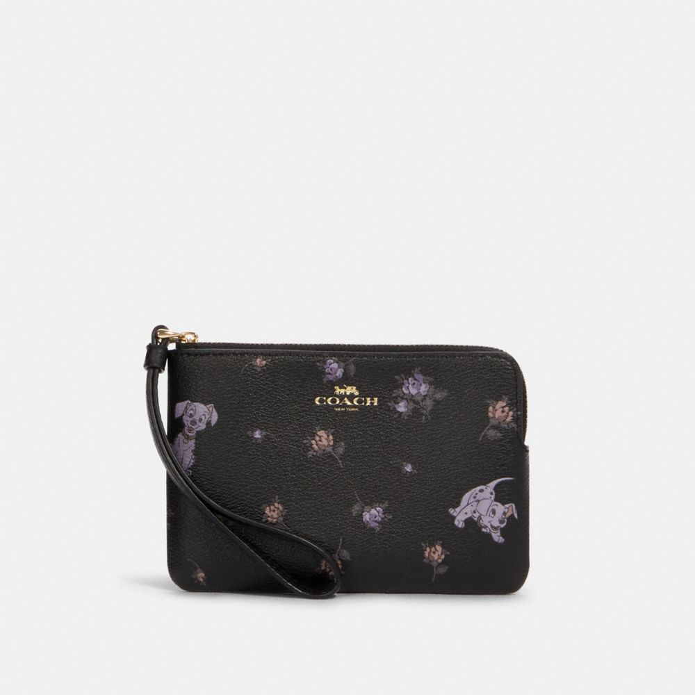 DISNEY X COACH CORNER ZIP WRISTLET WITH DALMATIAN FLORAL PRINT - IM/BLACK MULTI - COACH 91780