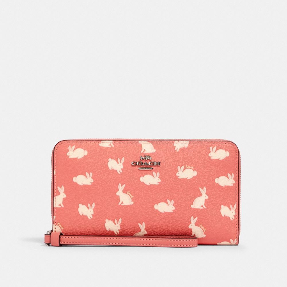 COACH 91830 LARGE PHONE WALLET WITH BUNNY SCRIPT PRINT SV/BRIGHT CORAL