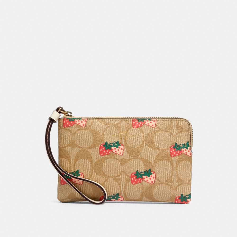 CORNER ZIP WRISTLET IN SIGNATURE CANVAS WITH STRAWBERRY PRINT - IM/KHAKI MULTI - COACH 93052