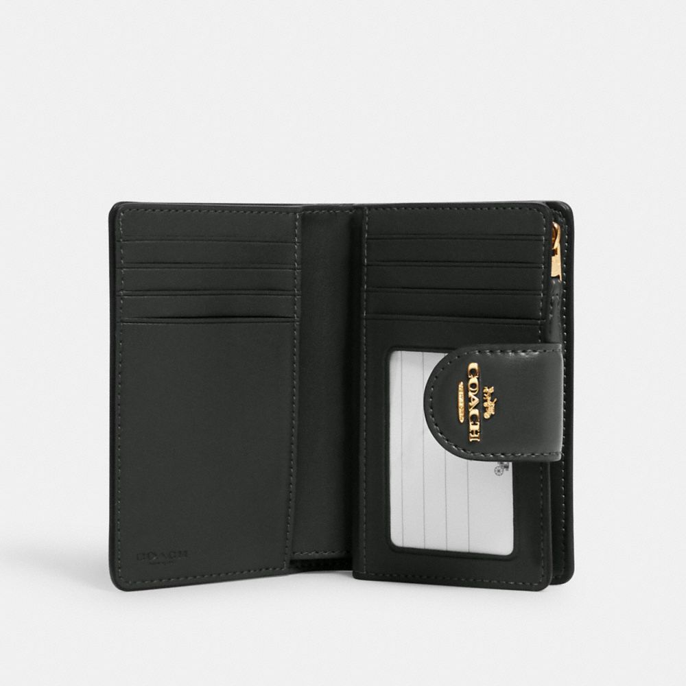MEDIUM CORNER ZIP WALLET IN SIGNATURE CANVAS