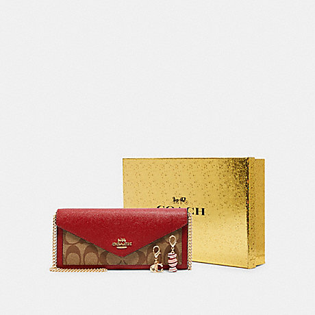 COACH BOXED SLIM ENVELOPE WALLET WITH CHAIN IN SIGNATURE CANVAS - IM/KHAKI/1941 RED - C1688