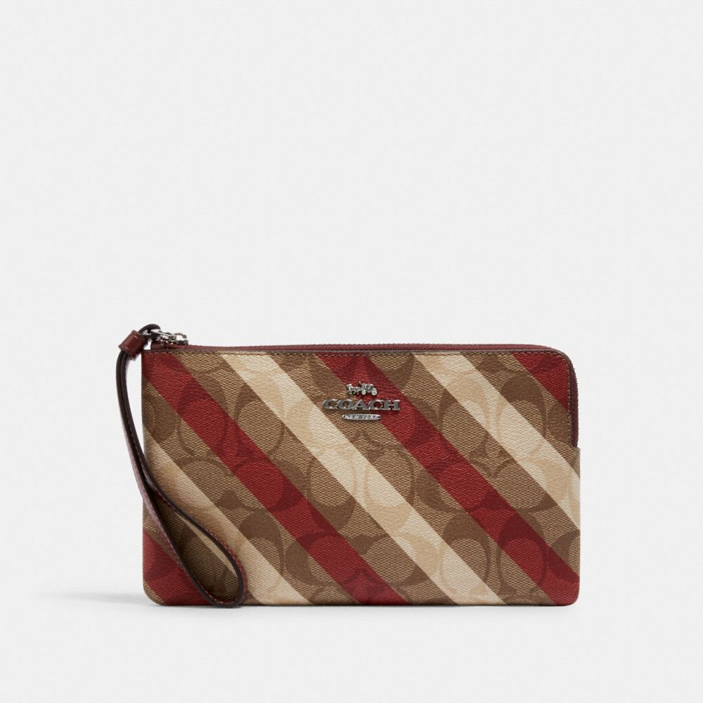 COACH LARGE CORNER ZIP WRISTLET IN SIGNATURE CANVAS WITH DIAGONAL STRIPE PRINT - SV/KHAKI MULTI - C1715