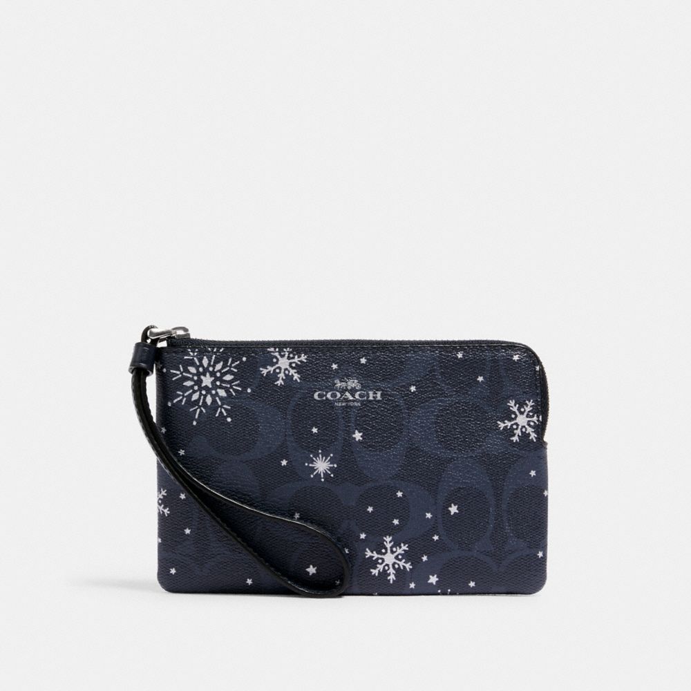 CORNER ZIP WRISTLET IN SIGNATURE CANVAS WITH SNOWFLAKE PRINT - C1862 - SV/MIDNIGHT MULTI