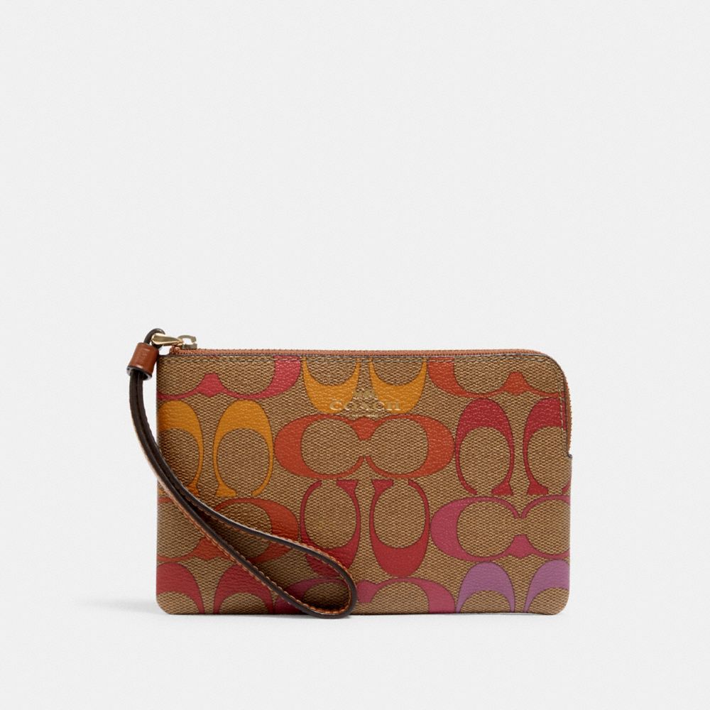 CORNER ZIP WRISTLET IN RAINBOW SIGNATURE CANVAS - IM/KHAKI MULTI - COACH C1868