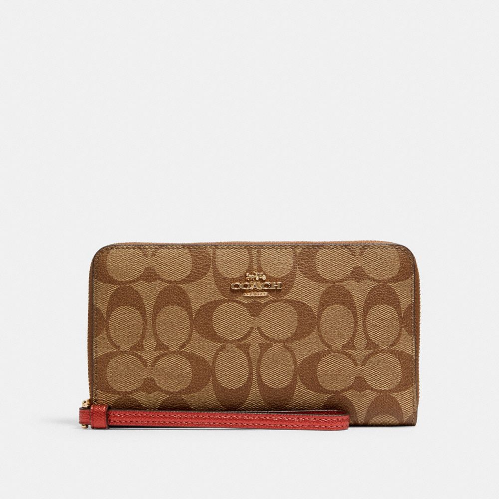 COACH LARGE PHONE WALLET IN SIGNATURE CANVAS - IM/KHAKI METALLIC CLAY - C1871