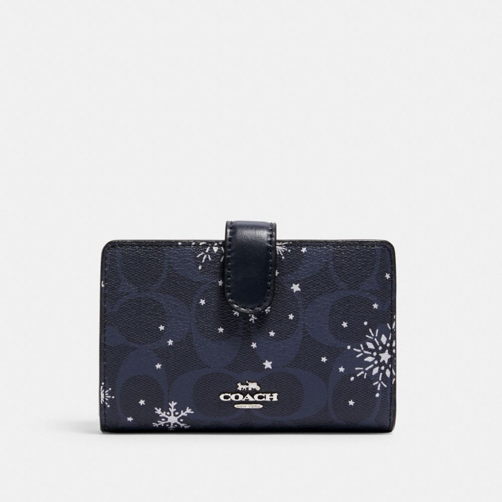 COACH C1927 - MEDIUM CORNER ZIP WALLET IN SIGNATURE CANVAS WITH SNOWFLAKE PRINT SV/MIDNIGHT MULTI