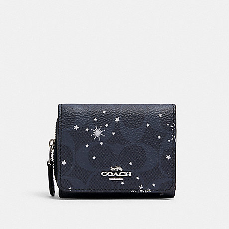 COACH SMALL TRIFOLD WALLET IN SIGNATURE CANVAS WITH SNOWFLAKE PRINT - SV/MIDNIGHT MULTI - C1928