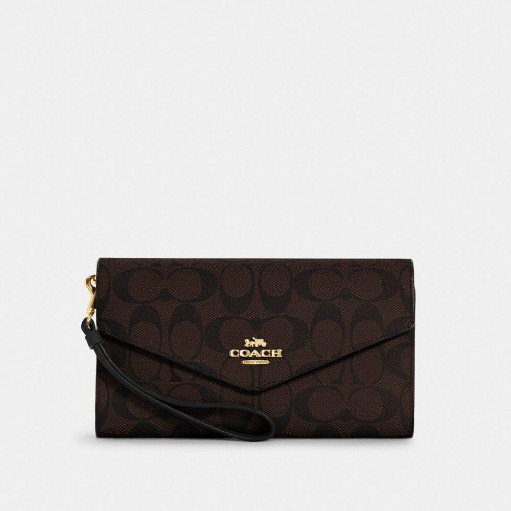 COACH TRAVEL ENVELOPE WALLET IN SIGNATURE CANVAS - IM/BROWN BLACK - C1962