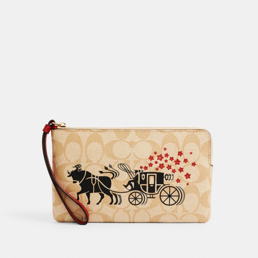 LUNAR NEW YEAR LARGE CORNER ZIP WRISTLET IN SIGNATURE CANVAS WITH OX AND CARRIAGE - C2259 - IM/LIGHT KHAKI MULTI