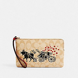 COACH C2259 Lunar New Year Large Corner Zip Wristlet In Signature Canvas With Ox And Carriage IM/LIGHT KHAKI MULTI