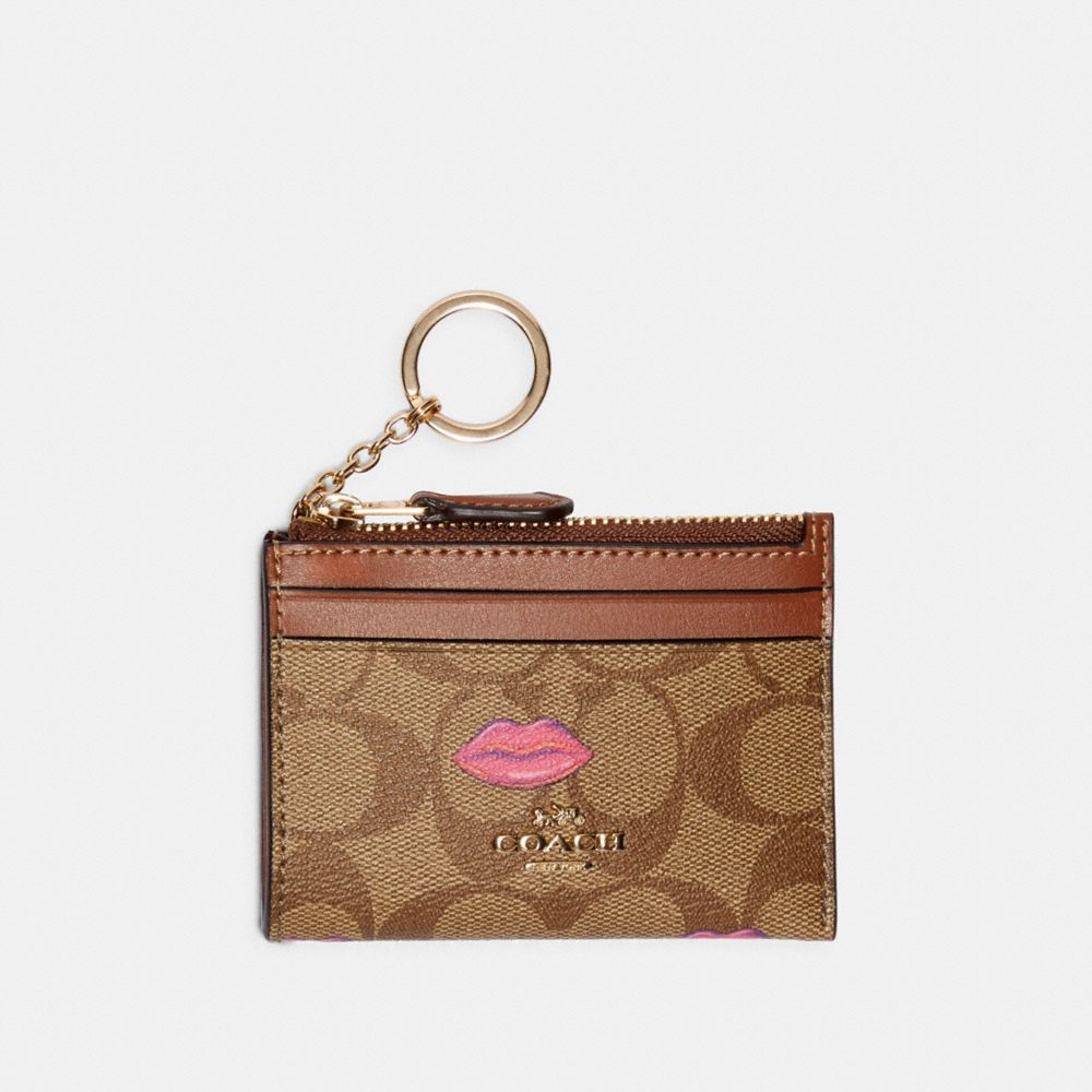 COACH MINI SKINNY ID CASE IN SIGNATURE CANVAS WITH LIPS PRINT - IM/KHAKI REDWOOD - C2922