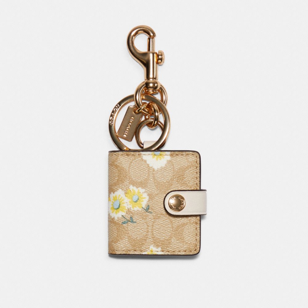 COACH C3130 PICTURE FRAME BAG CHARM IN SIGNATURE CANVAS WITH DAISY PRINT IM/LIGHT KHAKI YELLOW