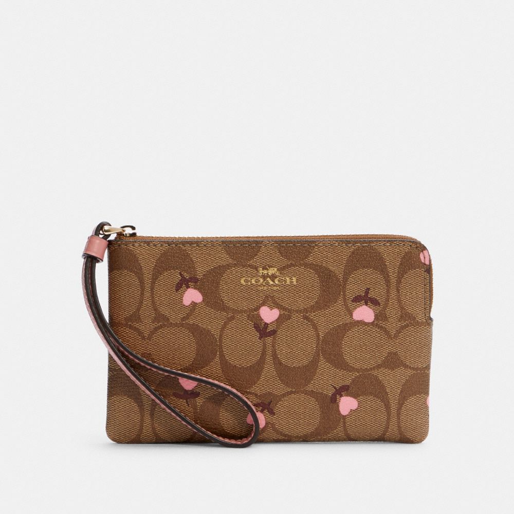 COACH CORNER ZIP WRISTLET IN SIGNATURE CANVAS WITH HEART FLORAL PRINT - IM/KHAKI RED MULTI - C3301