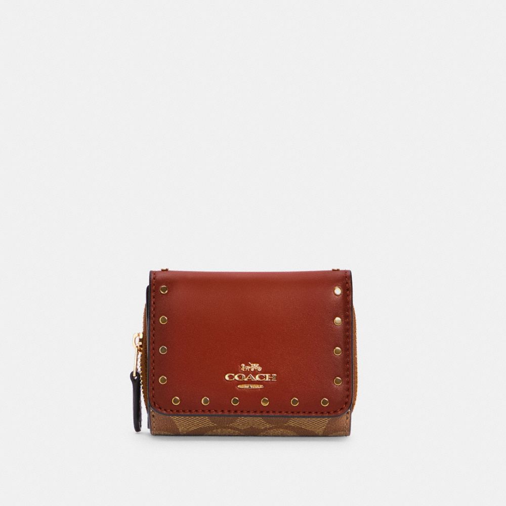 COACH SMALL TRIFOLD WALLET IN COLORBLOCK SIGNATURE CANVAS WITH RIVETS - IM/KHAKI/TERRACOTTA MULTI - C3323