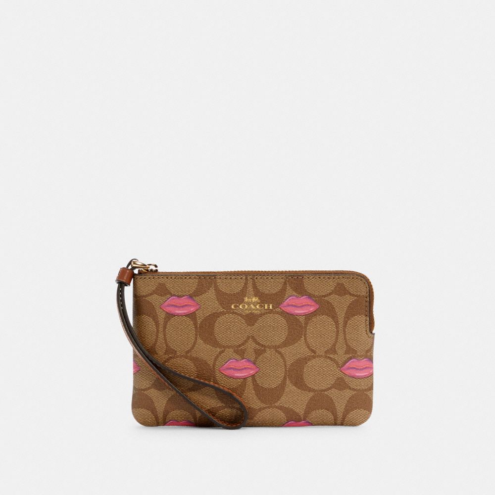 CORNER ZIP WRISTLET IN SIGNATURE CANVAS WITH LIPS PRINT - C3336 - IM/KHAKI REDWOOD