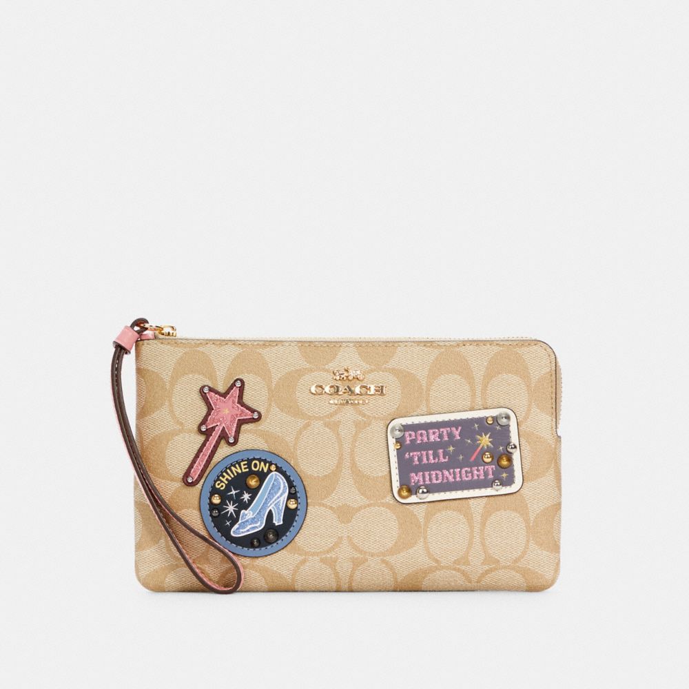 DISNEY X COACH LARGE CORNER ZIP WRISTLET IN SIGNATURE CANVAS WITH PATCHES - C3358 - IM/LIGHT KHAKI MULTI