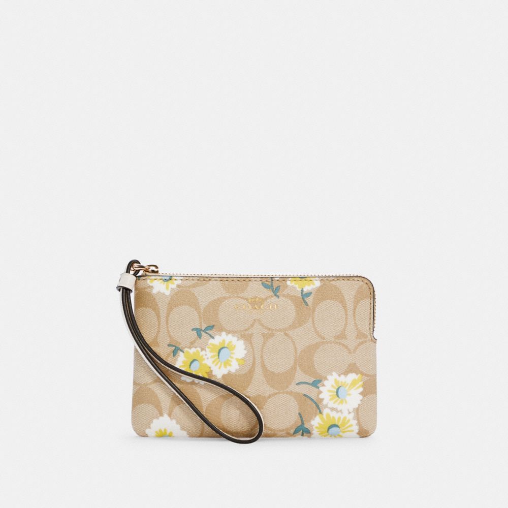 CORNER ZIP WRISTLET IN SIGNATURE CANVAS WITH DAISY PRINT - C3360 - IM/LIGHT KHAKI CHALK MULTI