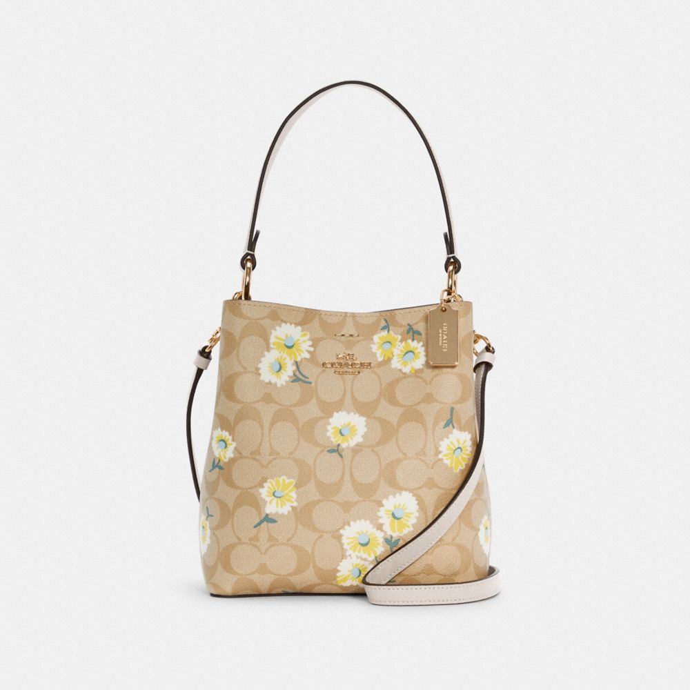 COACH SMALL TOWN BUCKET BAG IN SIGNATURE CANVAS WITH DAISY PRINT - IM/LIGHT KHAKI MULTI/CHALK - C3411