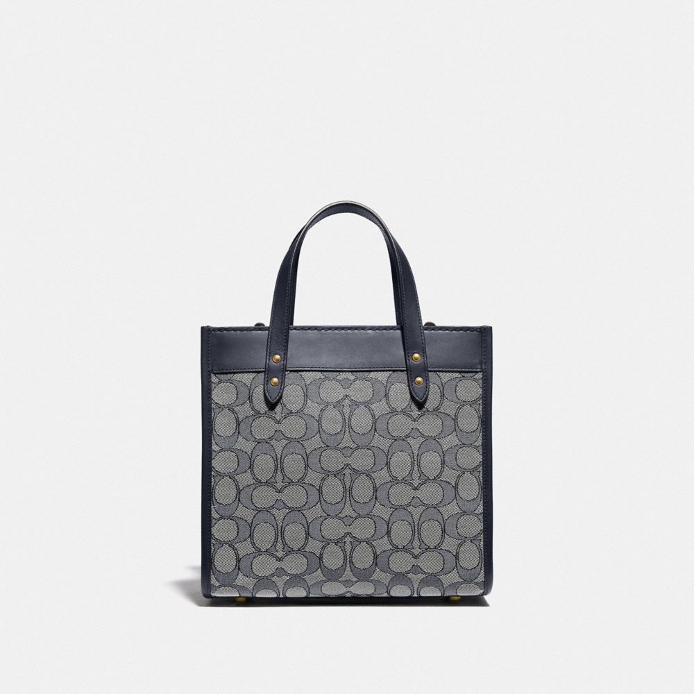 Field Tote 22 In Signature Jacquard - C3865 - BRASS/NAVY MIDNIGHT NAVY