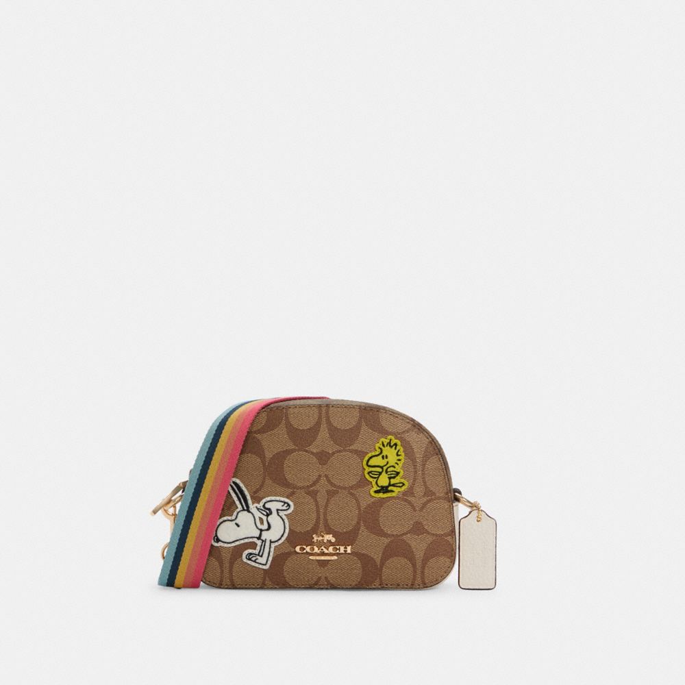 COACH COACH X PEANUTS MINI SERENA SATCHEL IN SIGNATURE CANVAS WITH VARSITY PATCHES - IM/KHAKI MULTI - C4238