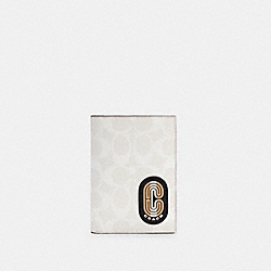 COACH PASSPORT CASE IN COLORBLOCK SIGNATURE CANVAS WITH STRIPED COACH PATCH - ONE COLOR - C4241
