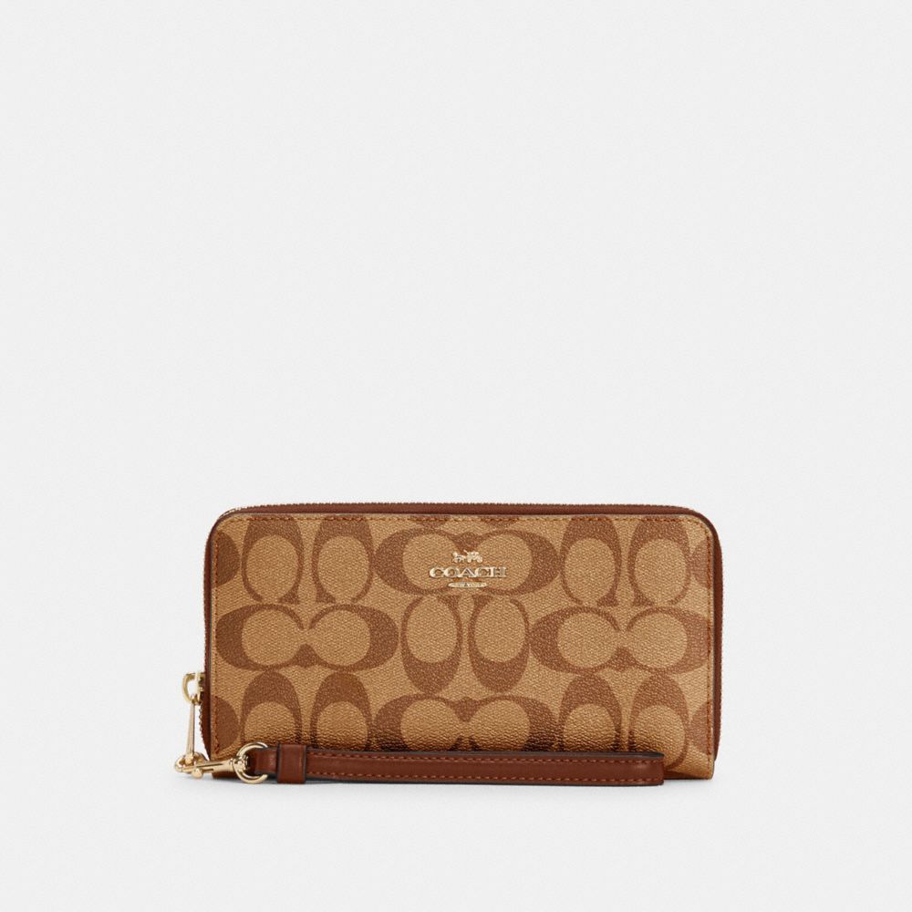 COACH LONG ZIP AROUND WALLET IN SIGNATURE CANVAS - ONE COLOR - C4452