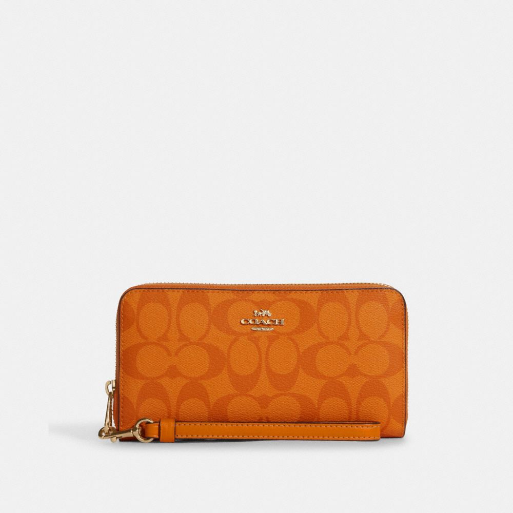 COACH Long Zip Around Wallet In Signature Canvas - ONE COLOR - C4452