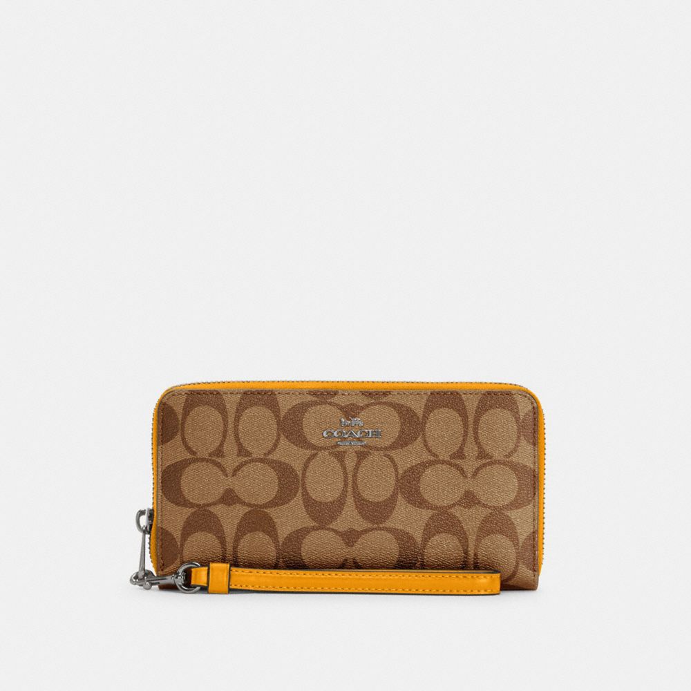 COACH LONG ZIP AROUND WALLET IN SIGNATURE CANVAS - QB/KHAKI/OCHRE - C4452