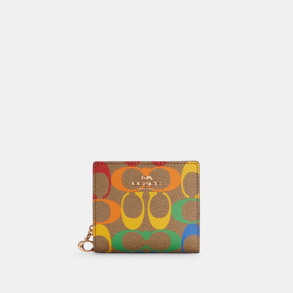 COACH SNAP WALLET IN RAINBOW SIGNATURE CANVAS - IM/LIGHT SADDLE MULTI - C4536