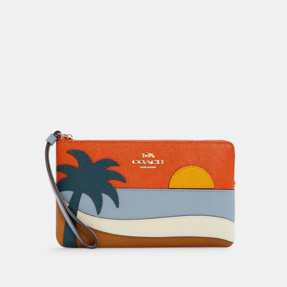 COACH C4560 - LARGE CORNER ZIP WRISTLET WITH BEACH POSTCARD IM/DARK ORANGE