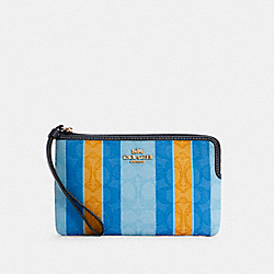 COACH LARGE CORNER ZIP WRISTLET IN SIGNATURE JACQUARD WITH STRIPES - IM/BLUE/YELLOW MULTI - C4566