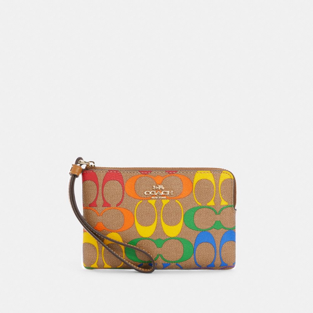 COACH C4572 - CORNER ZIP WRISTLET IN RAINBOW SIGNATURE CANVAS IM/LIGHT SADDLE MULTI