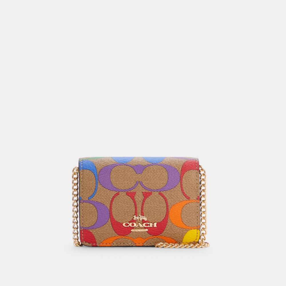 COACH MINI WALLET IN RAINBOW SIGNATURE CANVAS - IM/LIGHT SADDLE MULTI - C4696