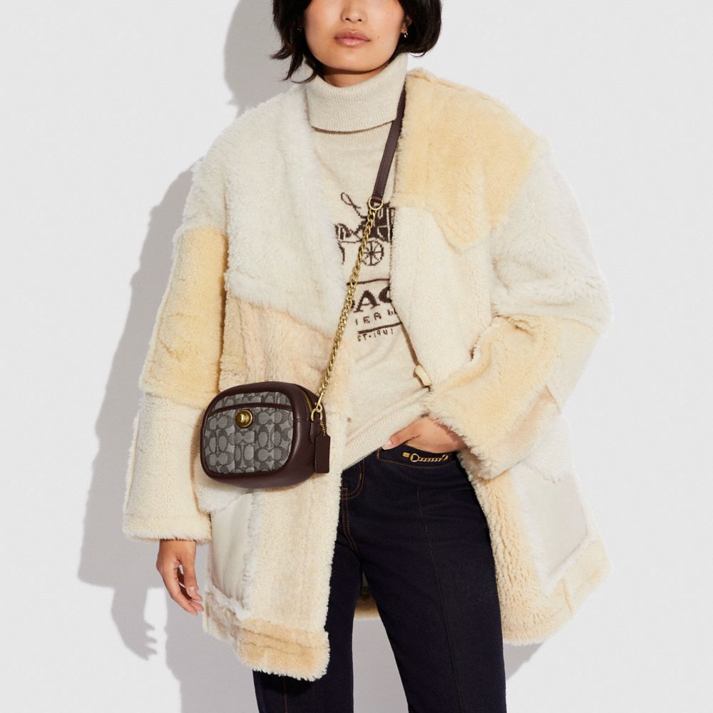 SMALL CAMERA BAG IN SIGNATURE JACQUARD WITH QUILTING