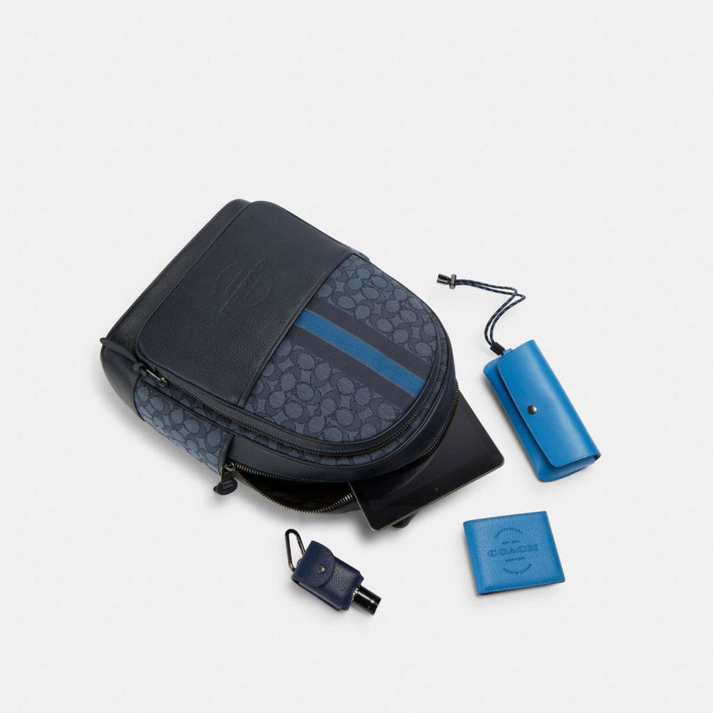 THOMPSON BACKPACK IN SIGNATURE JACQUARD WITH VARSITY STRIPE