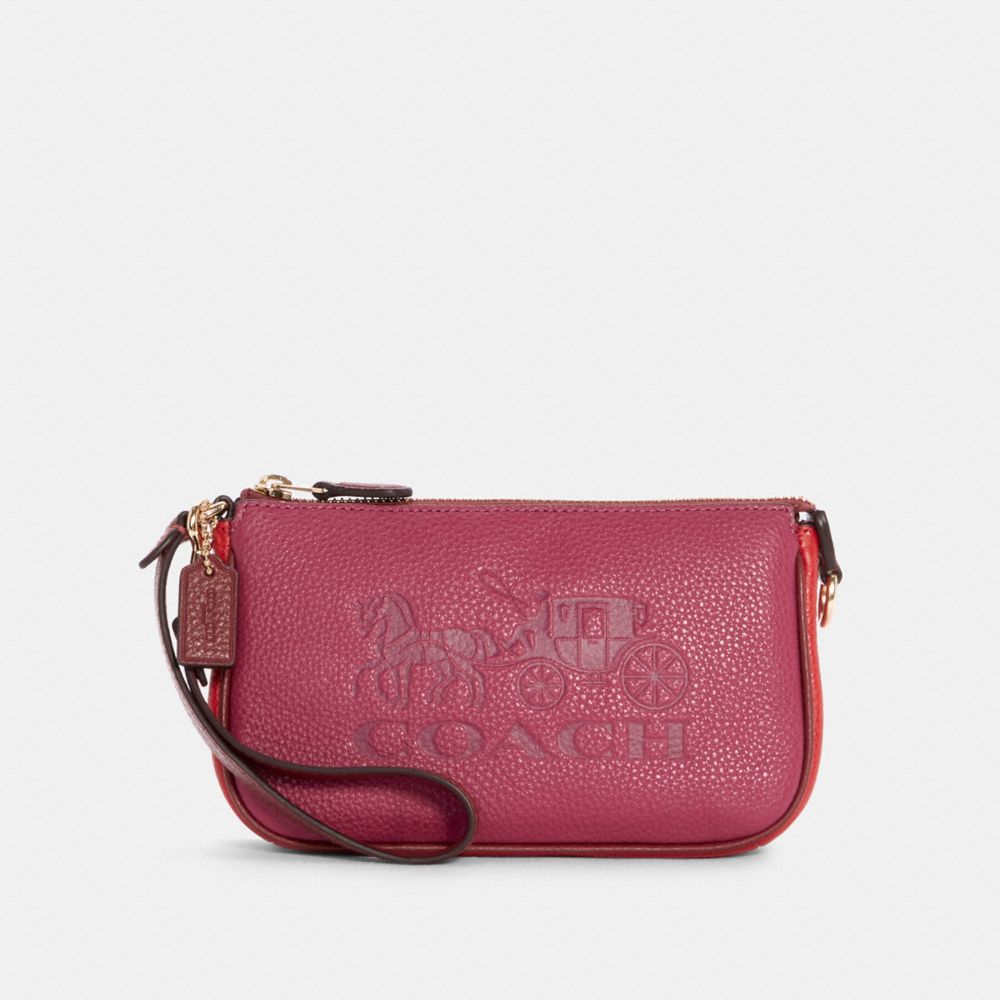 COACH Nolita Wristlet 19 With Cross Stitch Floral Print