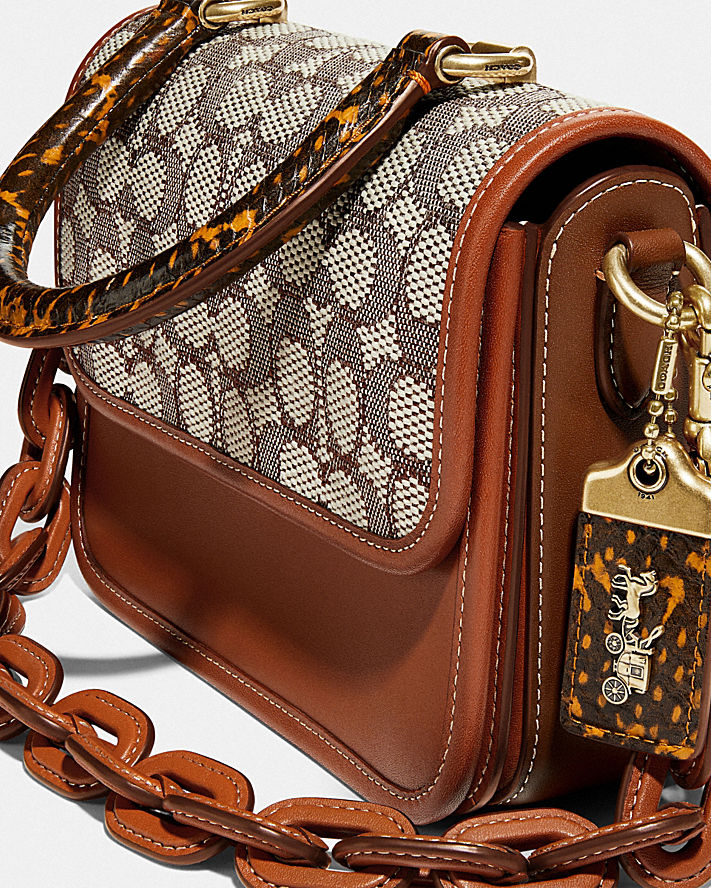 ROGUE TOP HANDLE IN SIGNATURE JACQUARD WITH SNAKESKIN DETAIL