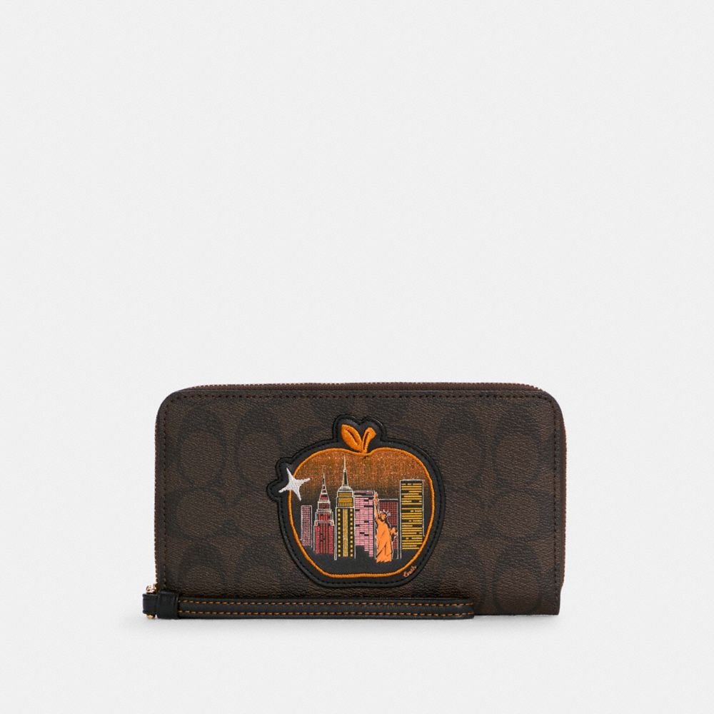 Dempsey Large Phone Wallet In Signature Canvas With Souvenir Skyline Apple - C6886 - GOLD/BROWN BLACK MULTI