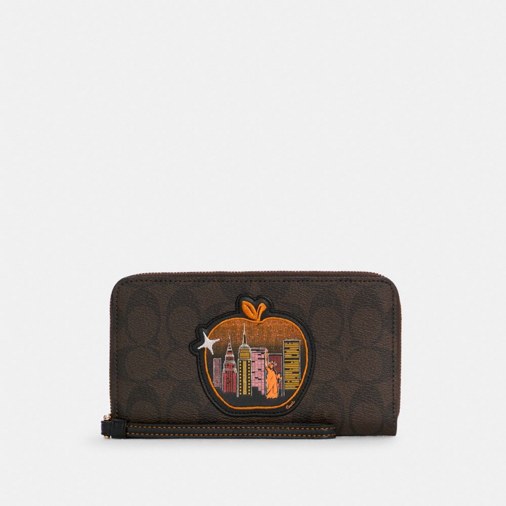 COACH C6886 Dempsey Large Phone Wallet In Signature Canvas With Souvenir Skyline Apple GOLD/BROWN BLACK MULTI