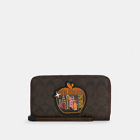 COACH C6886 Dempsey Large Phone Wallet In Signature Canvas With Souvenir Skyline Apple GOLD/BROWN BLACK MULTI