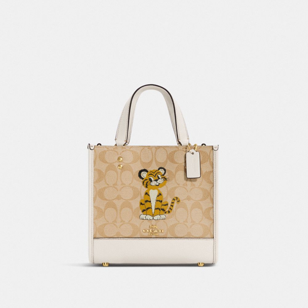 COACH Dempsey Tote 22 In Signature Canvas With Tiger - GOLD/LIGHT KHAKI CHALK - C7001