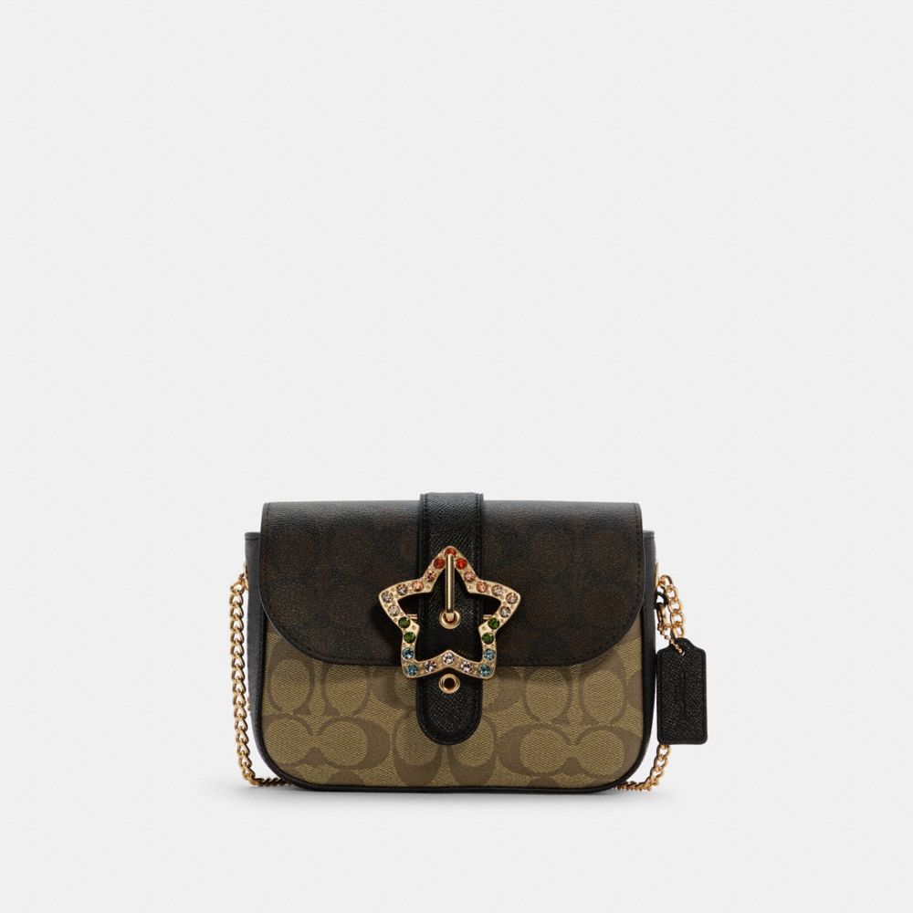 GEMMA CROSSBODY IN BLOCKED SIGNATURE CANVAS WITH STAR BUCKLE