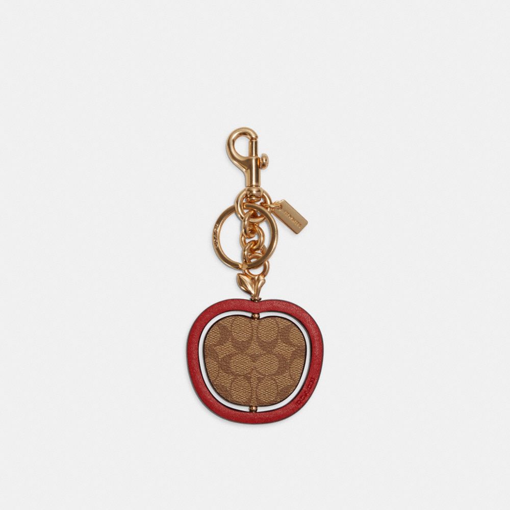 Spinning Apple Bag Charm In Signature Canvas - C7097 - GOLD/CHESTNUT/KHAKI RED