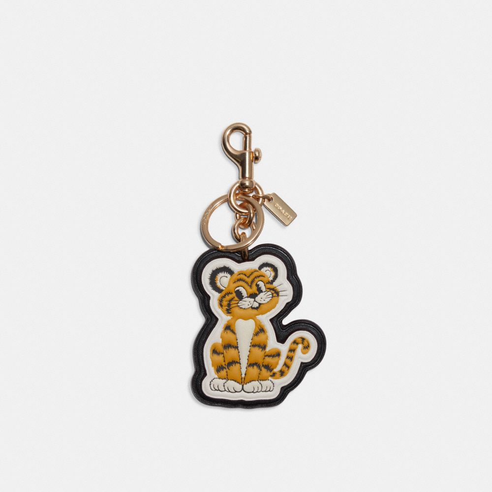 Lunar New Year Tiger Bag Charm In Signature Canvas - GOLD/LIGHT KHAKI CHALK - COACH C7122