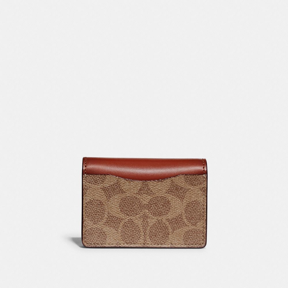 HALF FLAP CARD CASE IN COLORBLOCK SIGNATURE CANVAS