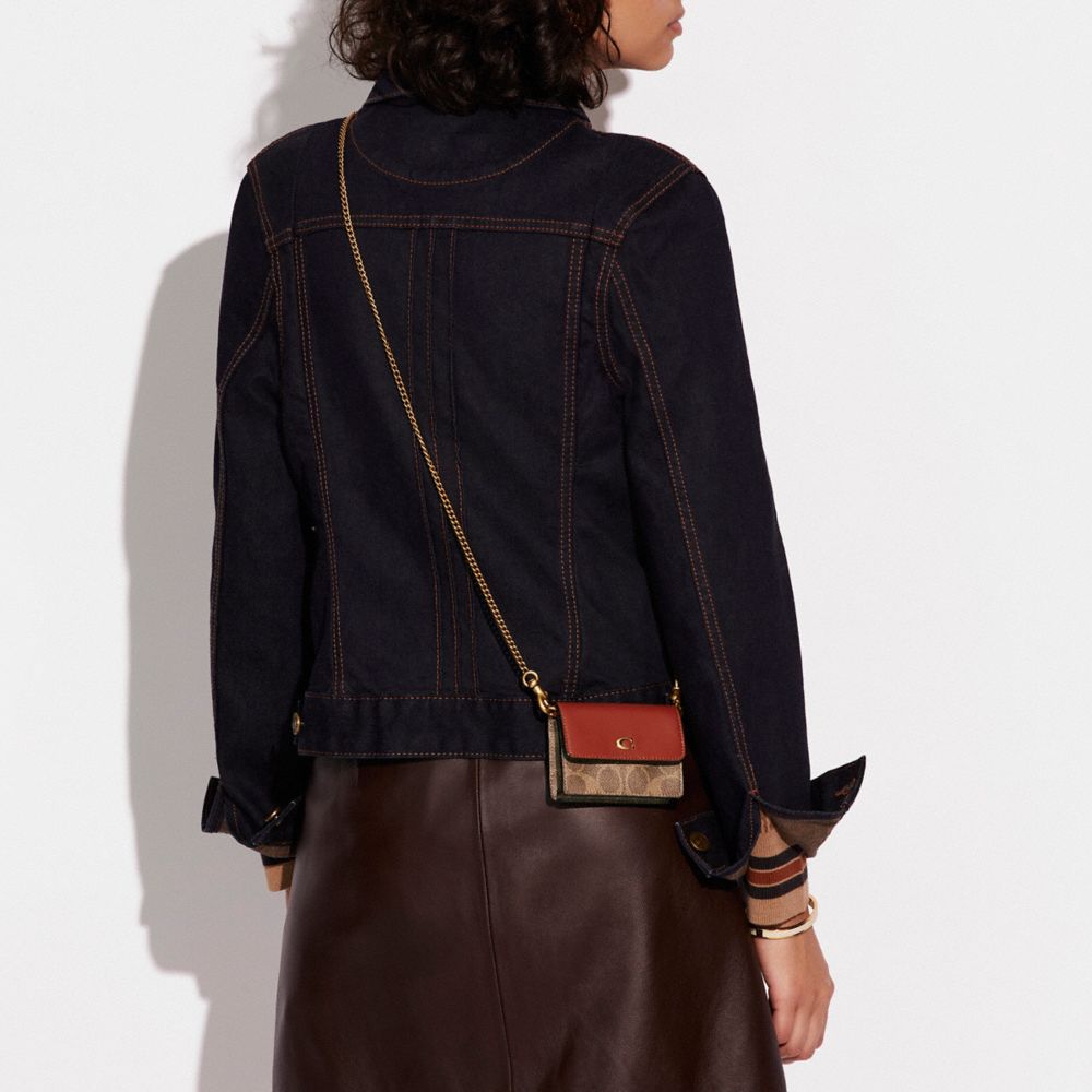 HALF FLAP CARD CASE IN COLORBLOCK SIGNATURE CANVAS