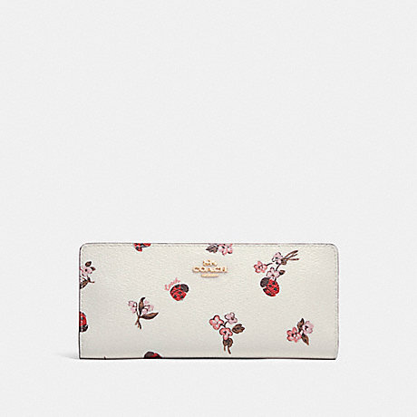 COACH Slim Wallet With Ladybug Floral Print - GOLD/CHALK MULTI - C7306