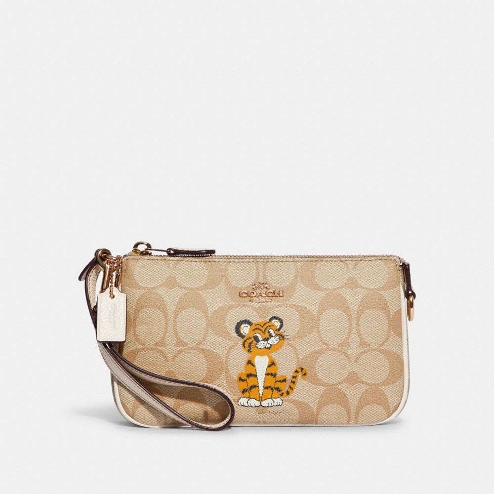 COACH Nolita 19 In Signature Canvas With Tiger - GOLD/LIGHT KHAKI CHALK - C7699