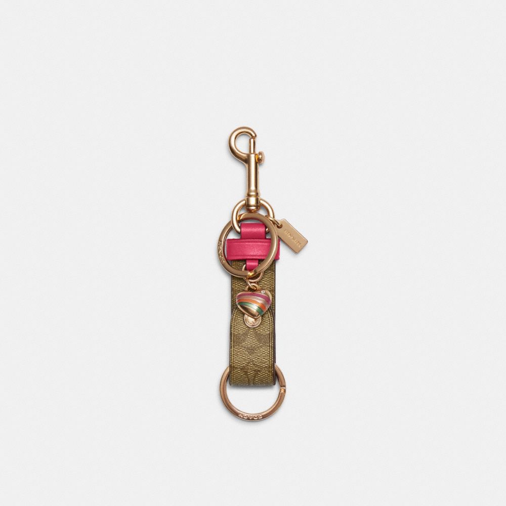 COACH Trigger Snap Bag Charm In Signature Canvas With Heart Charm - GOLD/KHAKI BOLD PINK - C8218