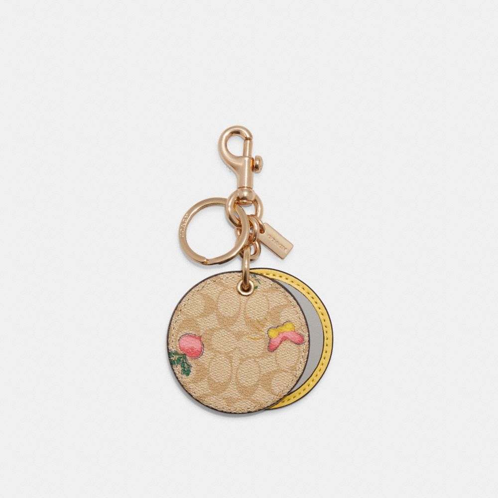 Mirror Bag Charm In Signature Canvas With Dreamy Veggie Print - GOLD/LIGHT KHAKI/PINK - COACH C8251